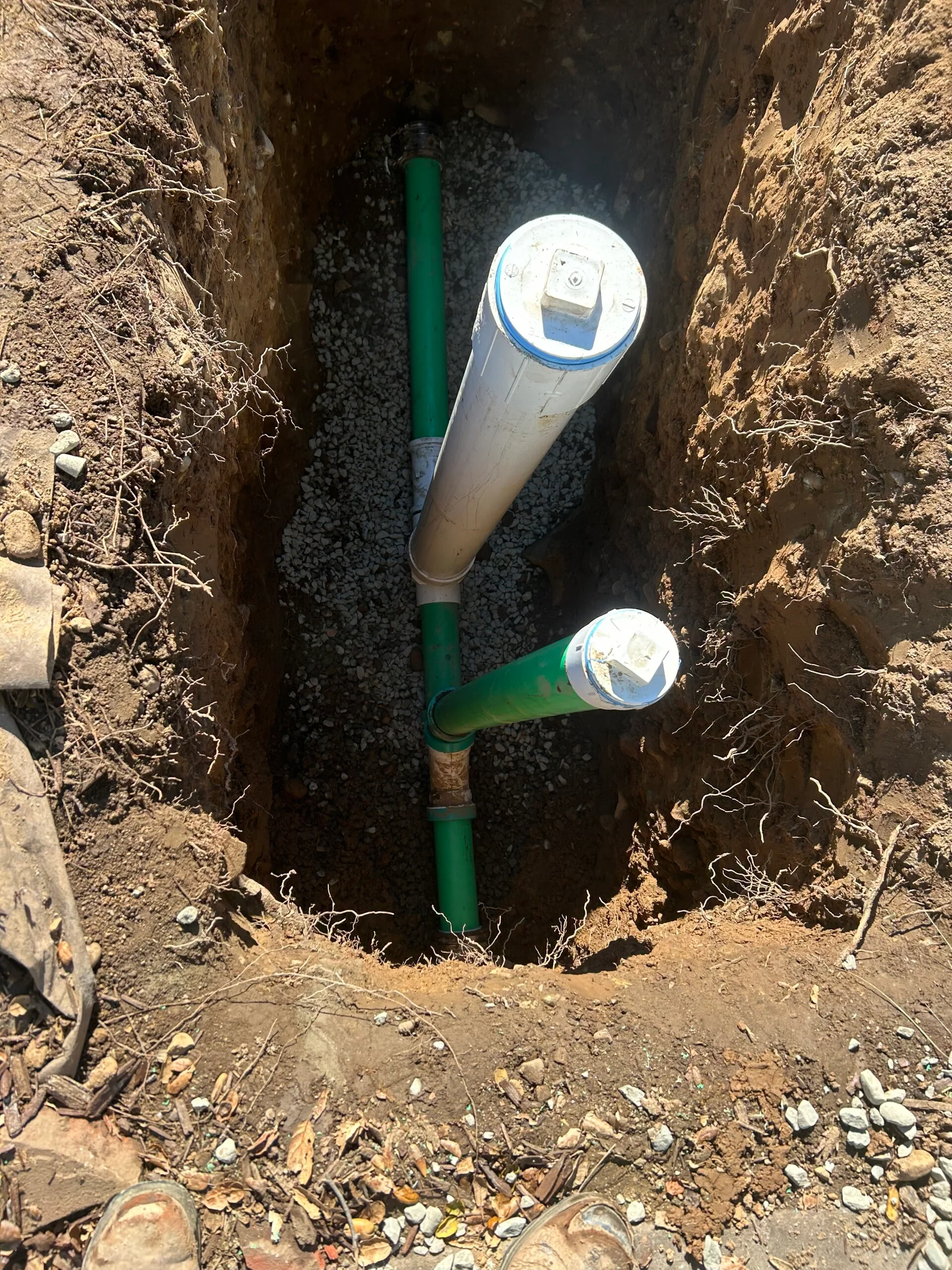 Professional sewer cleanout installation in front yard